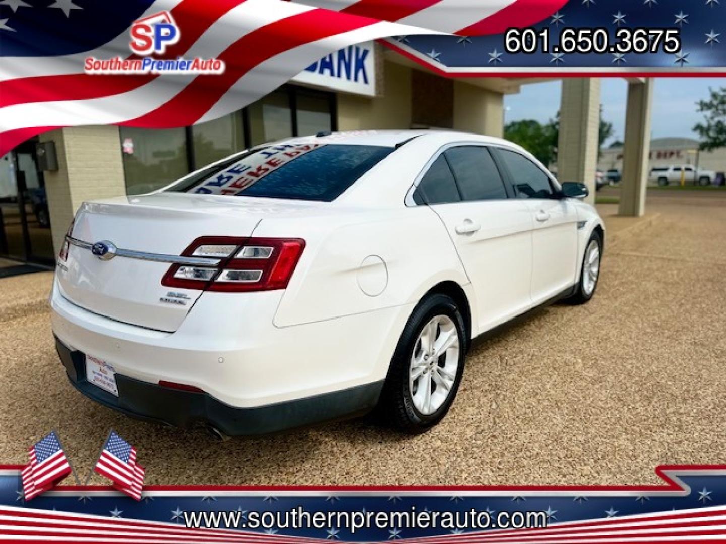 2015 WHITE FORD TAURUS SEL (1FAHP2E86FG) , located at 922 W. Beacon St., Philadelphia, MS, 39350, (601) 650-3675, 32.770447, -89.127151 - Photo#5